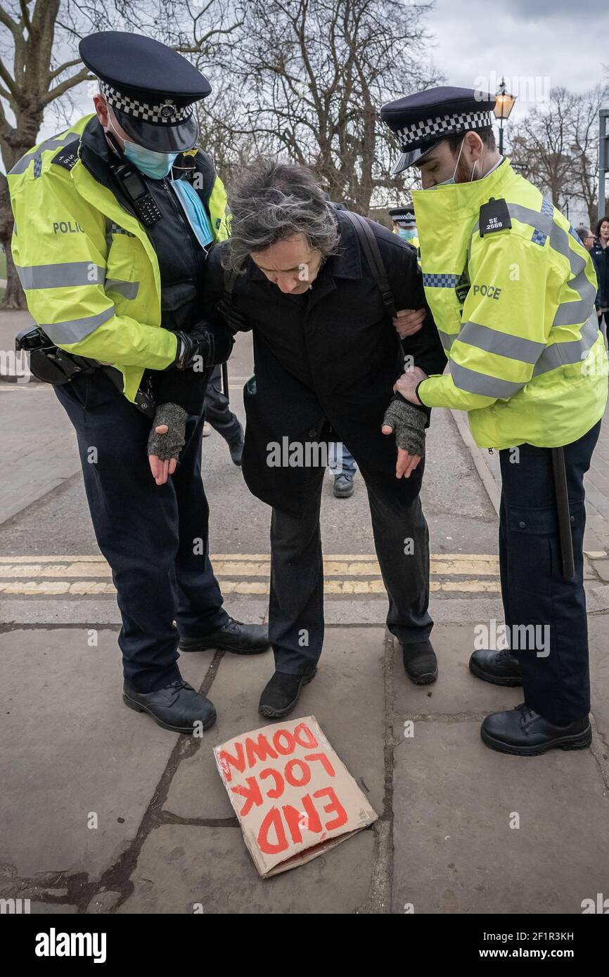 Coronavirus: Police break up and make arrests during an attempted anti-lockdown event of 20-30 protesters on Richmond Green in south east London, UK. Stock Photo