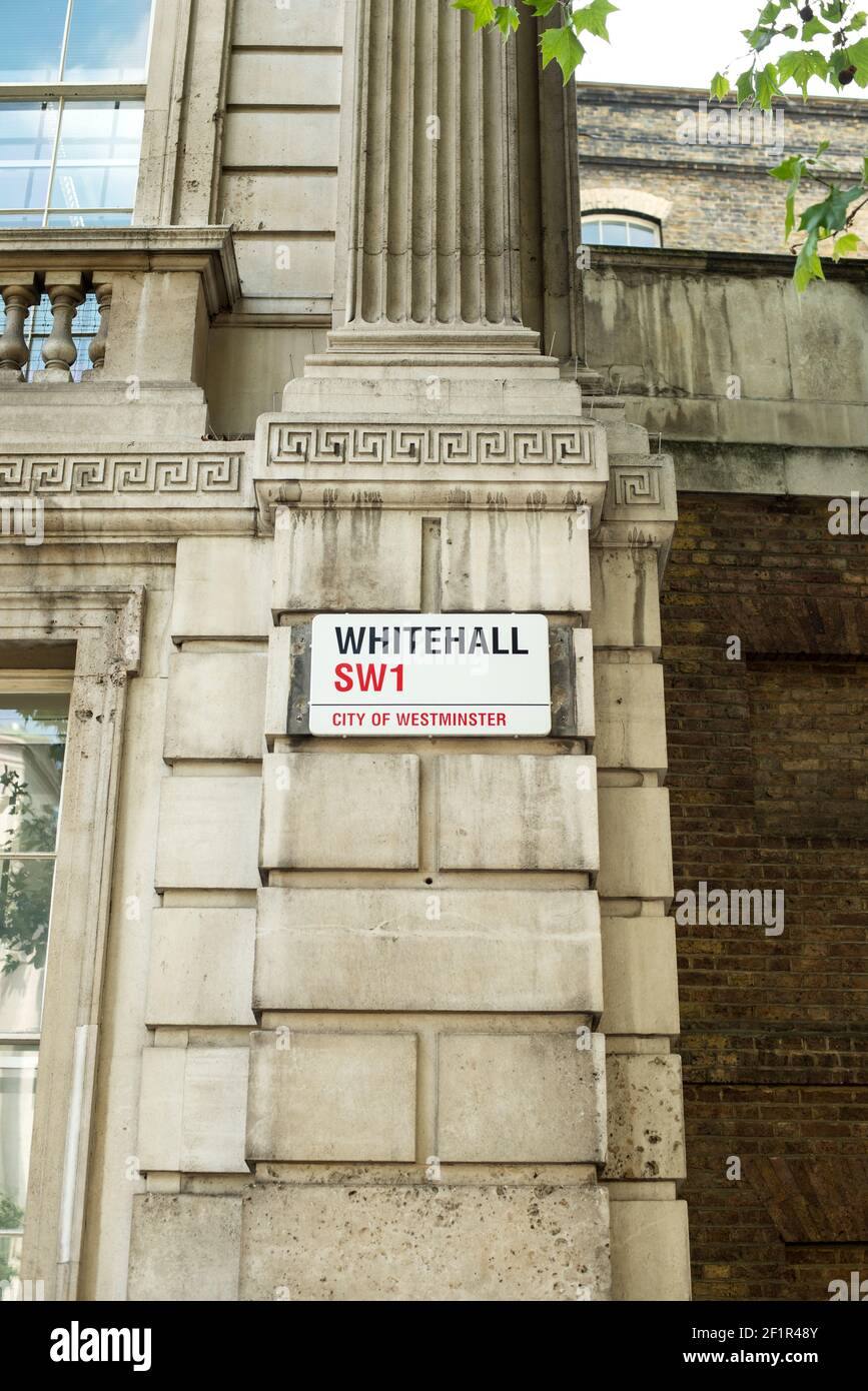 Portrait of street sign mounted on stone wall in London SW1 Stock Photo