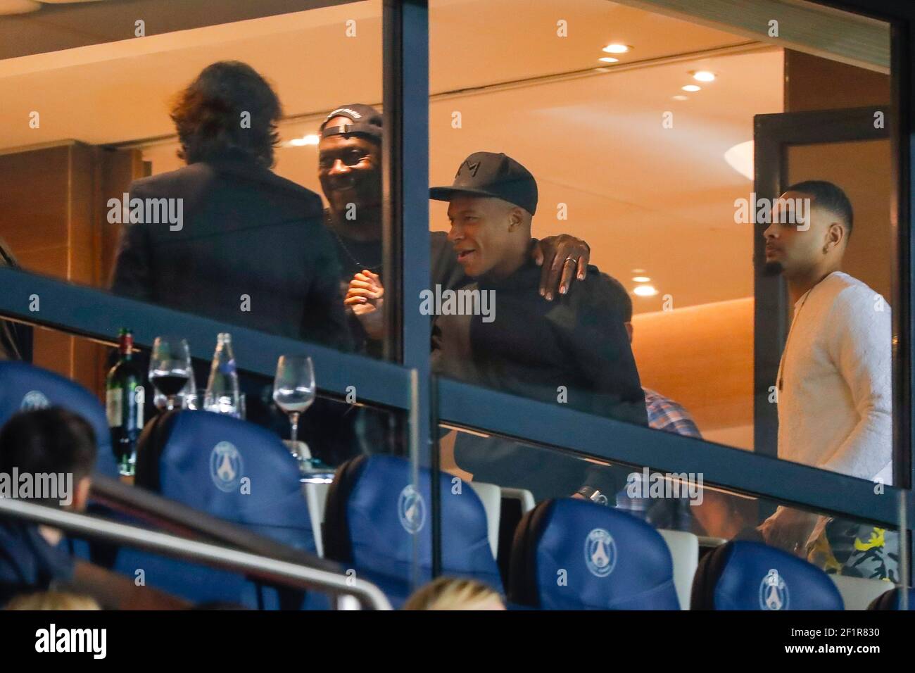 Basket ball player Michael Jeffrey Jordan hand in hand with Kylian Mbappe ( PSG) during the French championship L1 football match between Paris Saint- Germain and Stade de Reims on September 26, 2018 at