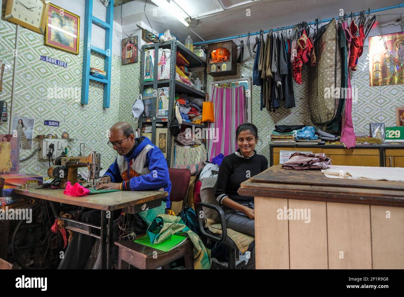 Kolkata, India - January 2021: Tailor working with a sewing machine in Kolkata on January 29, 2021 in West Bengal, India. Stock Photo