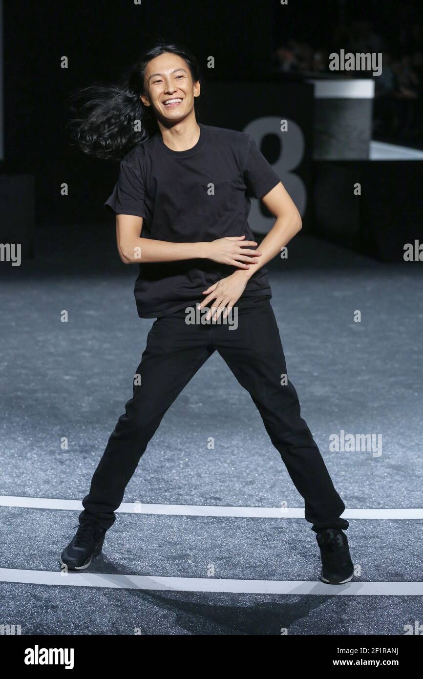Designer Alexander Wang acknowledges guests after his Alexander Wang X H&M  Collection Launch at the Armory on the Hudson on October 16, 2014 in New Yo  Stock Photo - Alamy