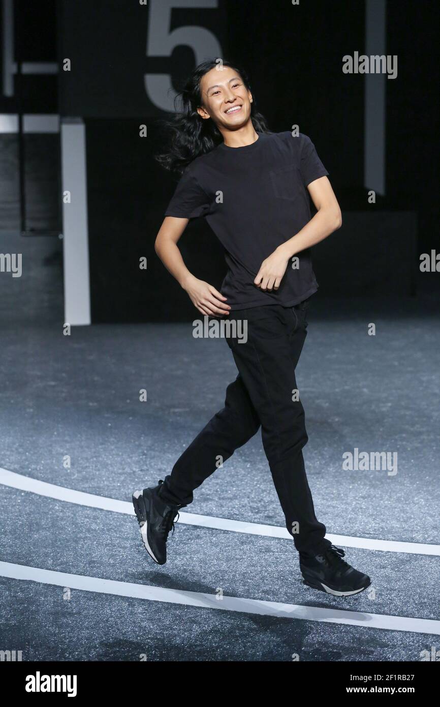 Designer Alexander Wang acknowledges guests after his Alexander Wang X H&M  Collection Launch at the Armory on the Hudson on October 16, 2014 in New Yo  Stock Photo - Alamy
