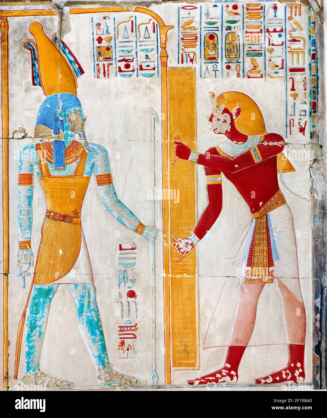 Osiris. Seti opens the door for Osiris, The temple of King Seti I at Abydos, print, 1933 Stock Photo