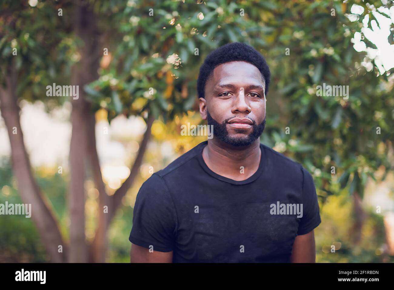 Young black man headshot hi-res stock photography and images - Alamy