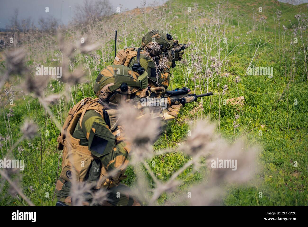 Aiming rifles soldiers in military hi-res stock photography and images ...