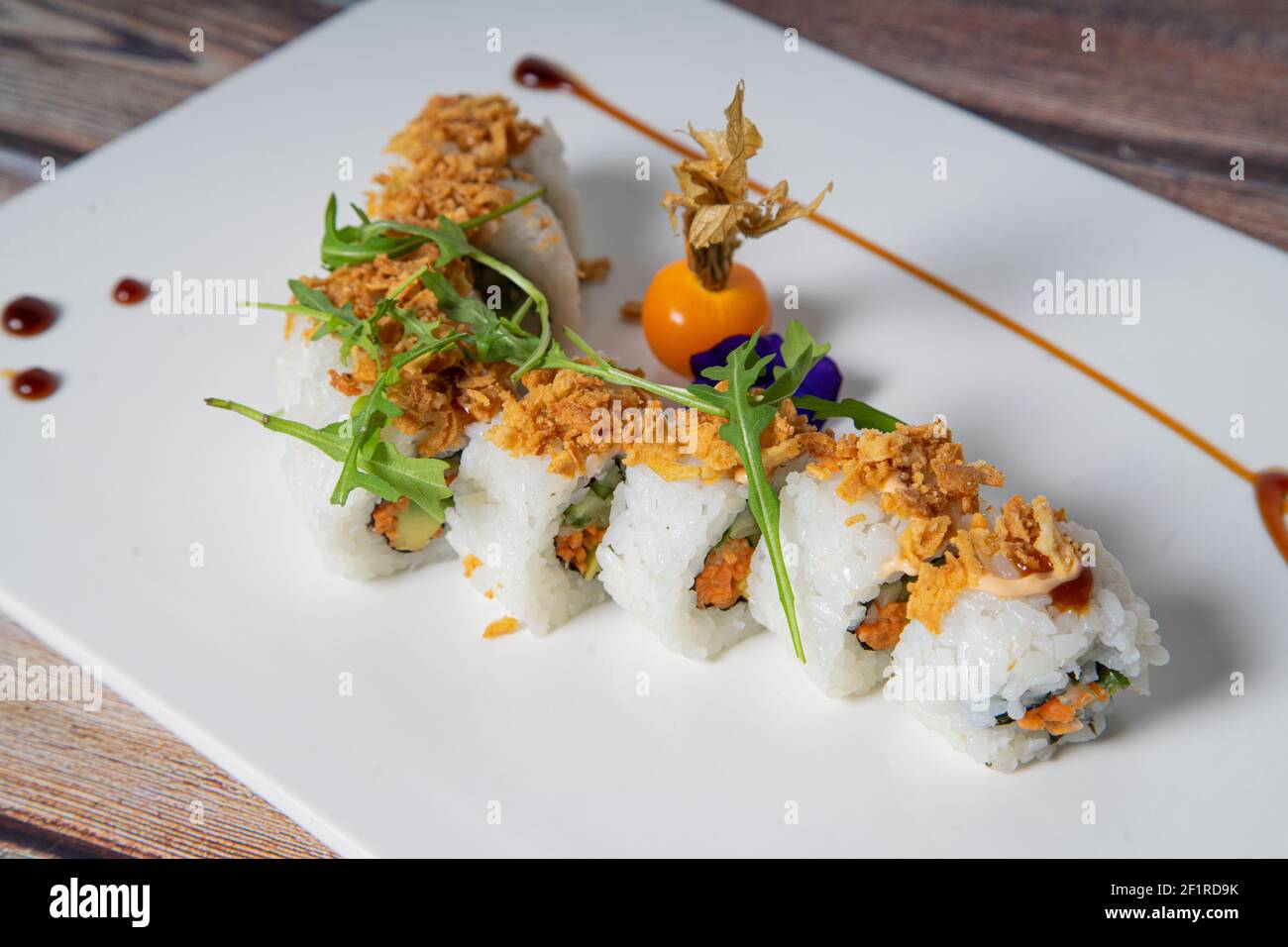 Vegan sushi roll with crispy onion. Japanese food. Stock Photo