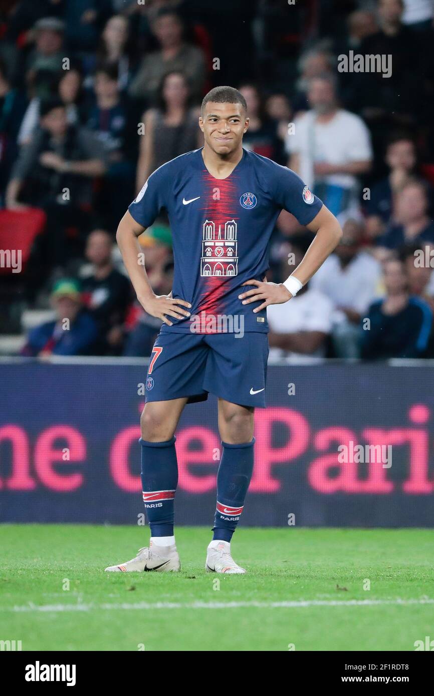 Kylian Mbappe Lottin (PSG) reacted during the French championship L1 football match between Paris Saint-Germain and AS Monaco on April 21, 2019 at Parc des Princes stadium in Paris, France, Paris Saint-Germain will pay a special tribute to the firefighters of Paris and Ile-de-France, who bravely fought the fire that partially ravaged Notre-Dame Cathedral last Monday at the end of the day - A jersey with a visual of Notre-Dame de Paris will be worn by the players of Paris Saint-Germain - On the back of this jersey, the inscription 'Notre-Dame' will be flocked in place of the players' names - Ph Stock Photo