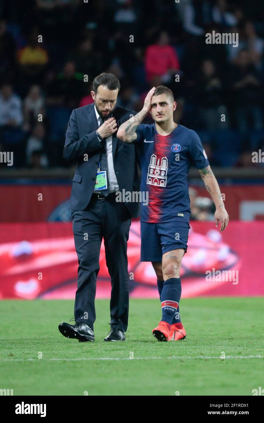 Marco Verratti (PSG) must left the game during the French championship L1 football match between Paris Saint-Germain and AS Monaco on April 21, 2019 at Parc des Princes stadium in Paris, France, Paris Saint-Germain will pay a special tribute to the firefighters of Paris and Ile-de-France, who bravely fought the fire that partially ravaged Notre-Dame Cathedral last Monday at the end of the day - A jersey with a visual of Notre-Dame de Paris will be worn by the players of Paris Saint-Germain - On the back of this jersey, the inscription 'Notre-Dame' will be flocked in place of the players' names Stock Photo