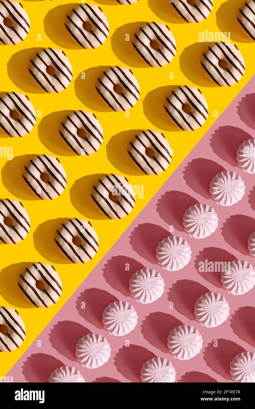a pattern on a yellow background of donuts Stock Photo