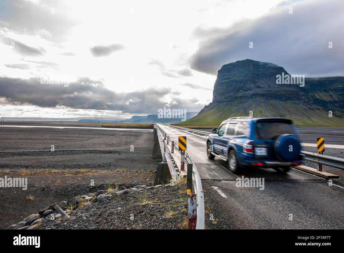 car driving over Skeiðarársandur on the longest bridge in Iceland Stock Photo