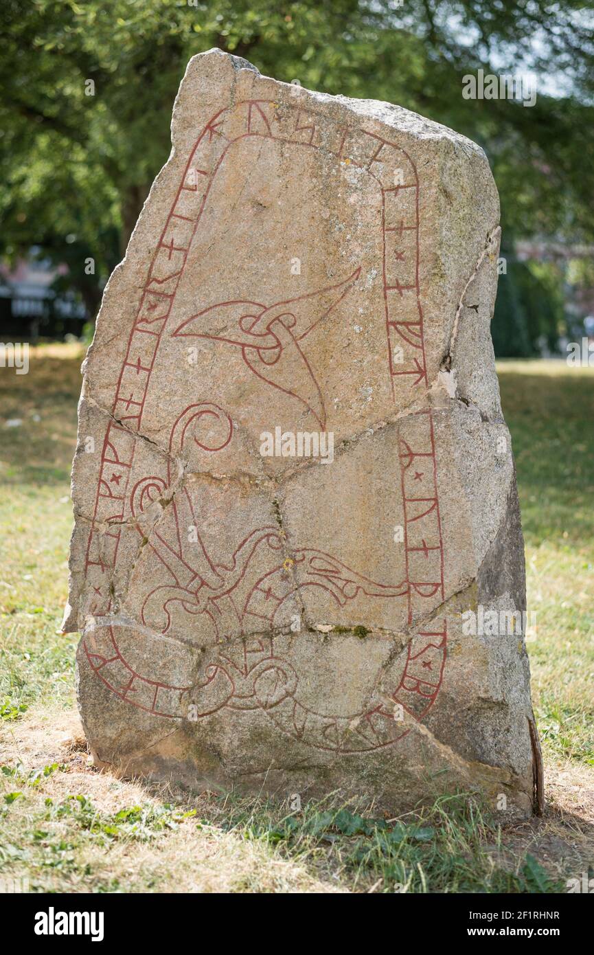 A rune stone with an insciption from the 11th Century AD in Universitetsgarten, Uppsala, Sweden. Stock Photo