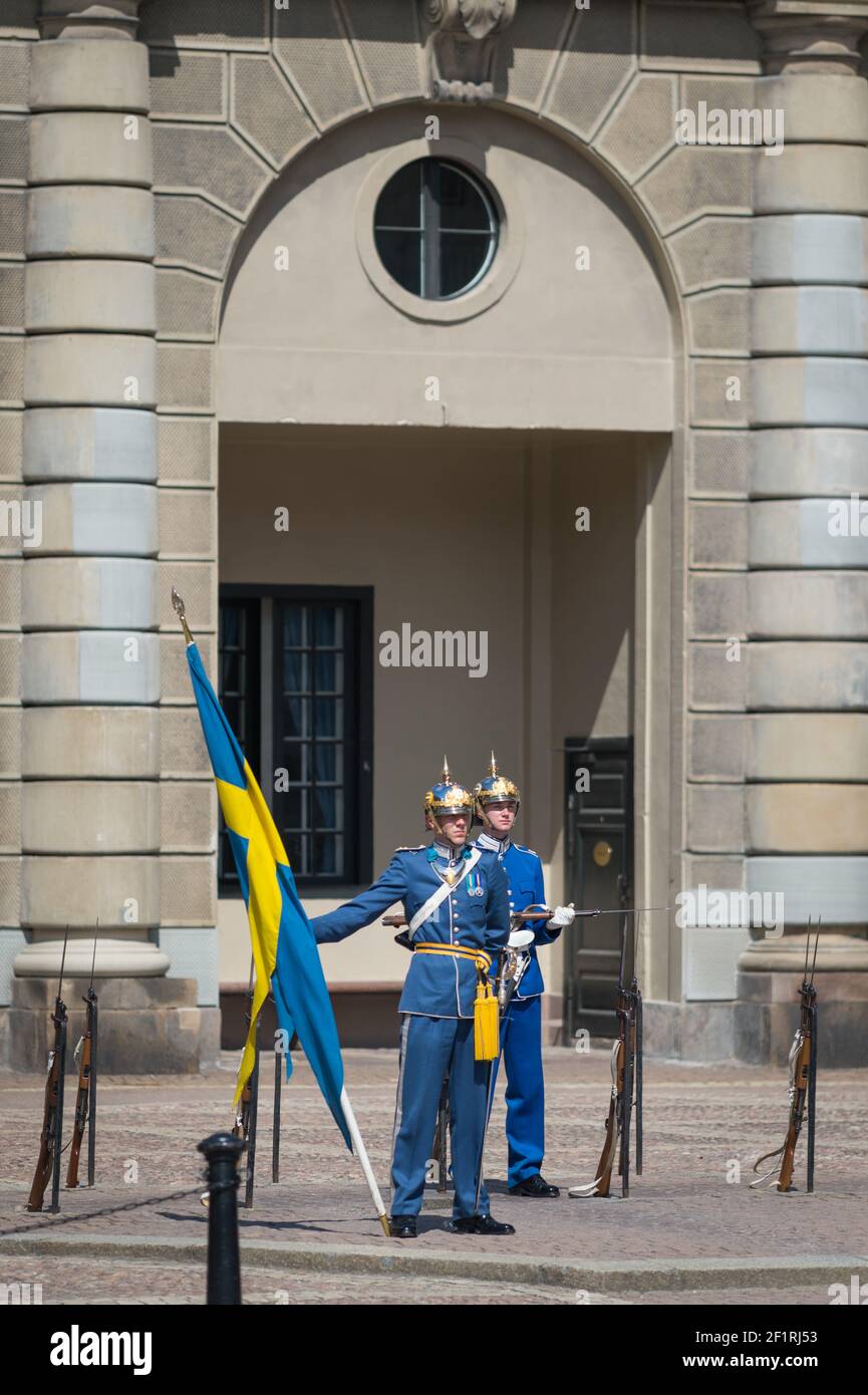 Changing of the Guard, accompanied by the Royal Swedish Navy Band, Kungliga Slottet, Gamla Stan, Stockholm, Sweden. Stock Photo