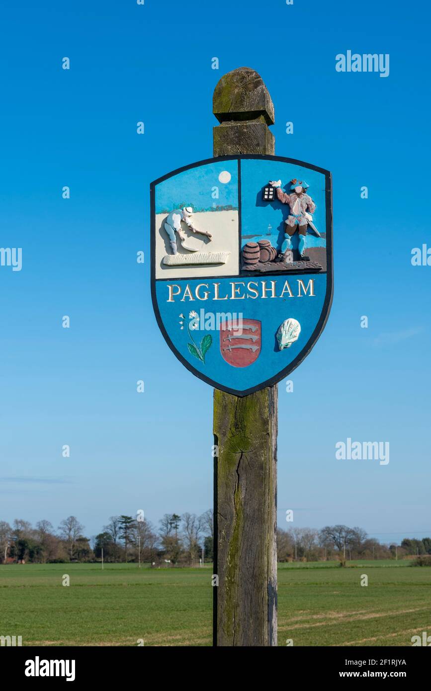 Paglesham village sign, with painted relief pictures depicting those