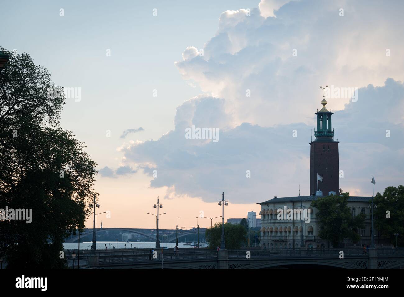 Storm clouds behind the Stadshuset or Stockholms stadshus (City Hall), Kungsholmen, Stockholm, Sweden. Stock Photo