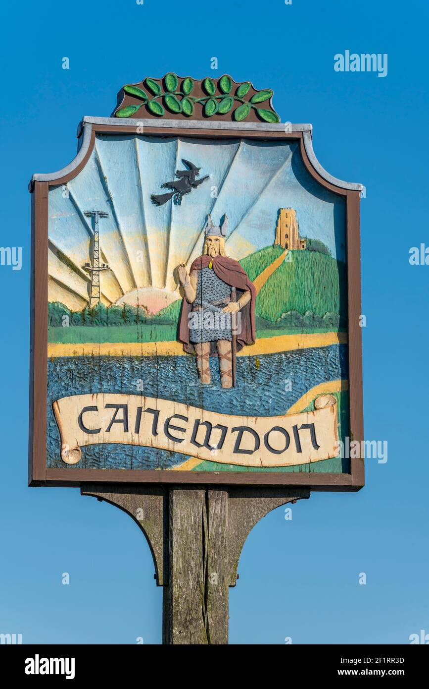 Canewdon village sign, with relief pictures of local history. A Viking figure from nearby Battle of Ashingdon. Witch, Chain Home radar and church Stock Photo