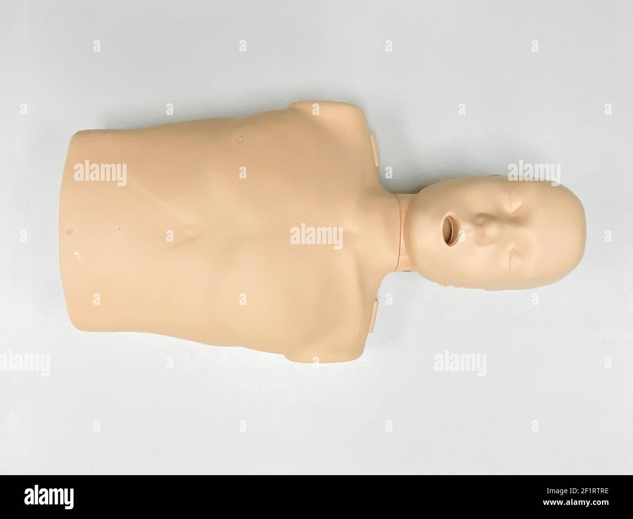 CPR dummy on white background for first aid and cardiopulmonary resuscitation training Stock Photo