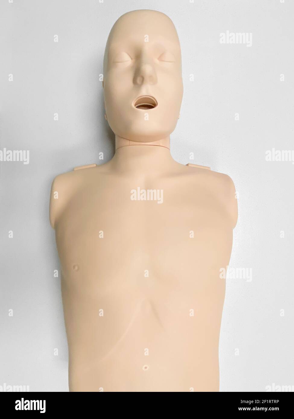 CPR dummy on white background for first aid and cardiopulmonary resuscitation training Stock Photo