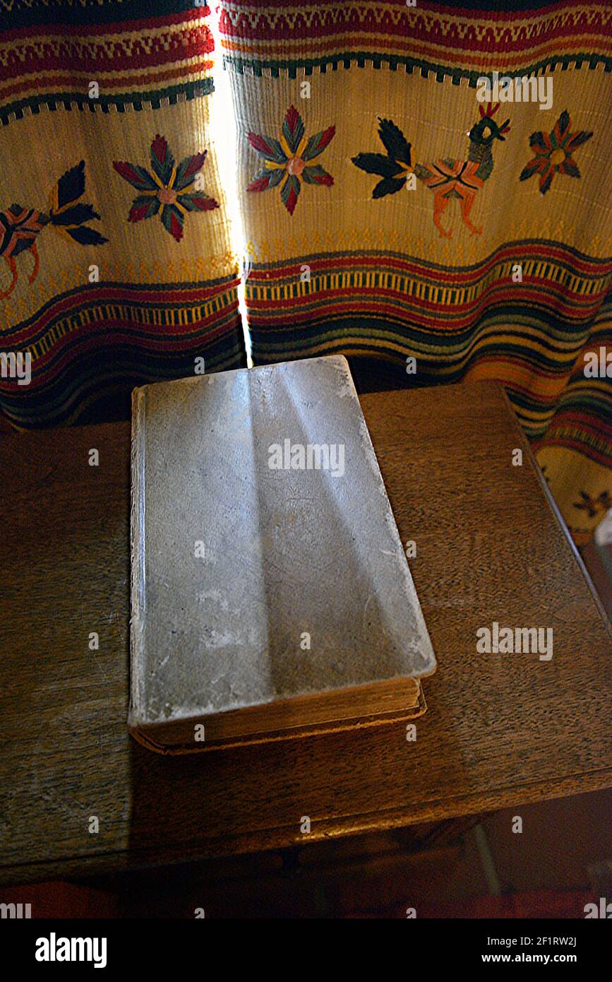 Bible in front of a window in the bedroom, Scotty's Castle,  Death Valley, California Stock Photo