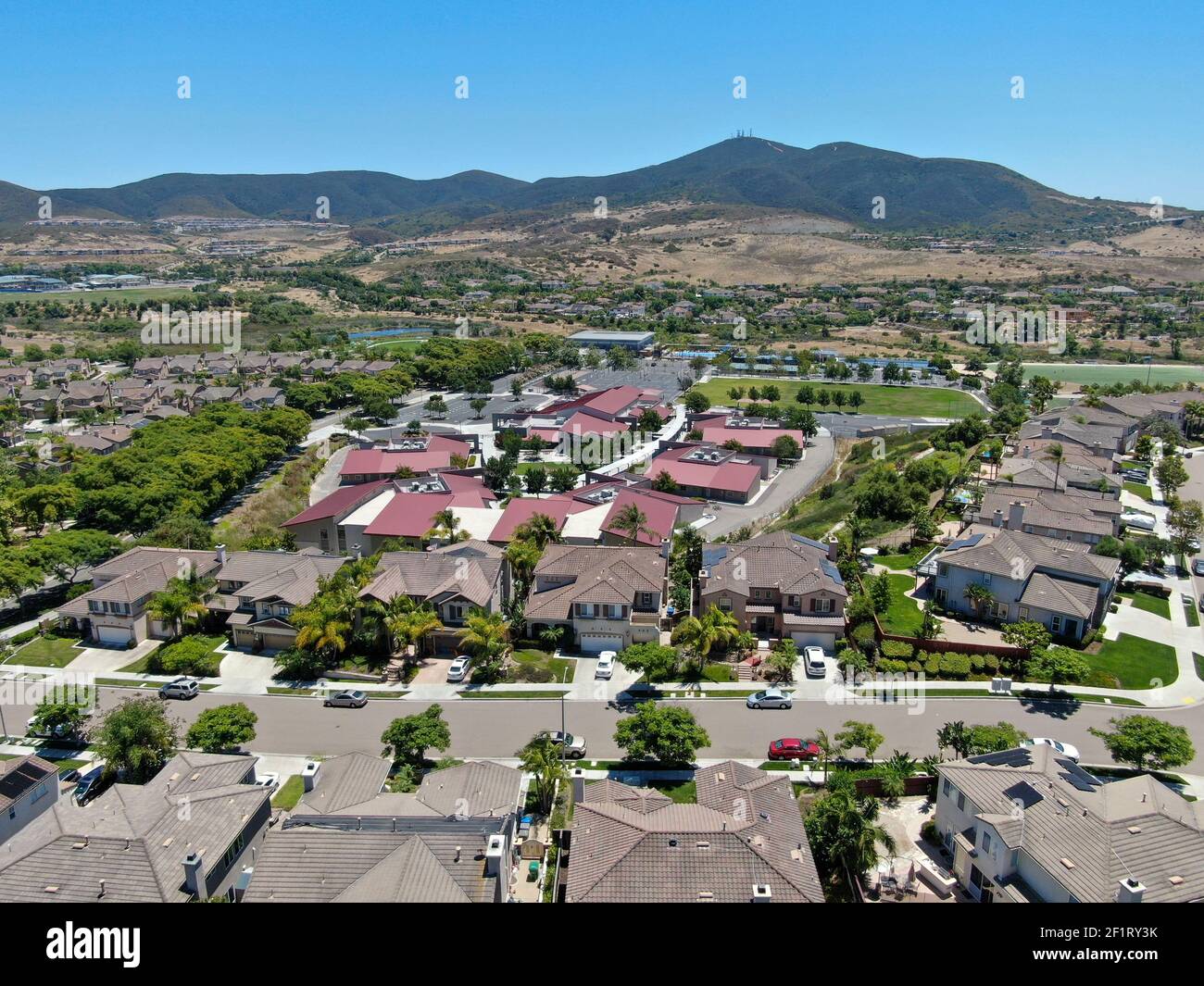 Aerial view of suburban neighborhood with big mansions in San Diego