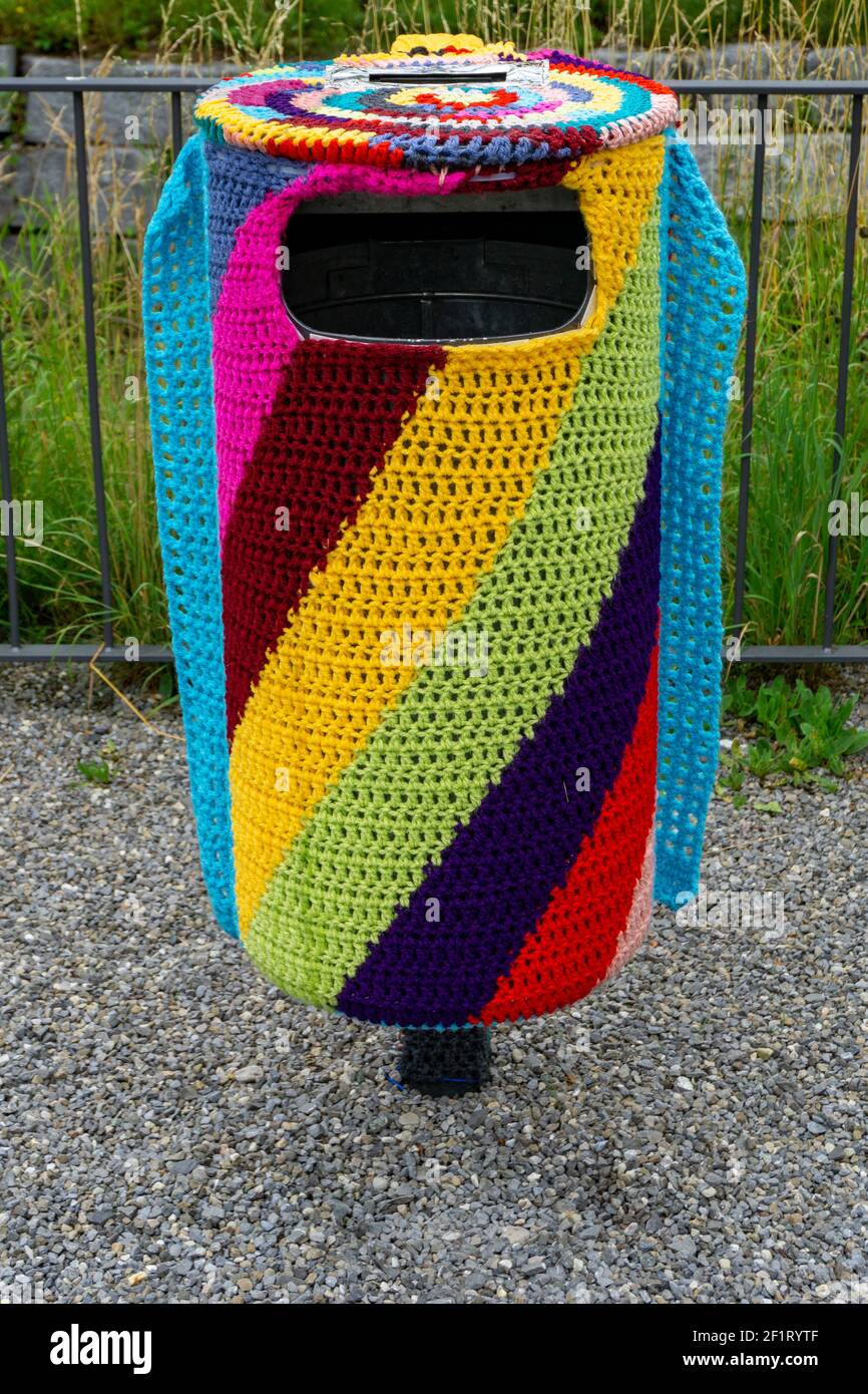 Colorful knitting covering a trash can Stock Photo - Alamy