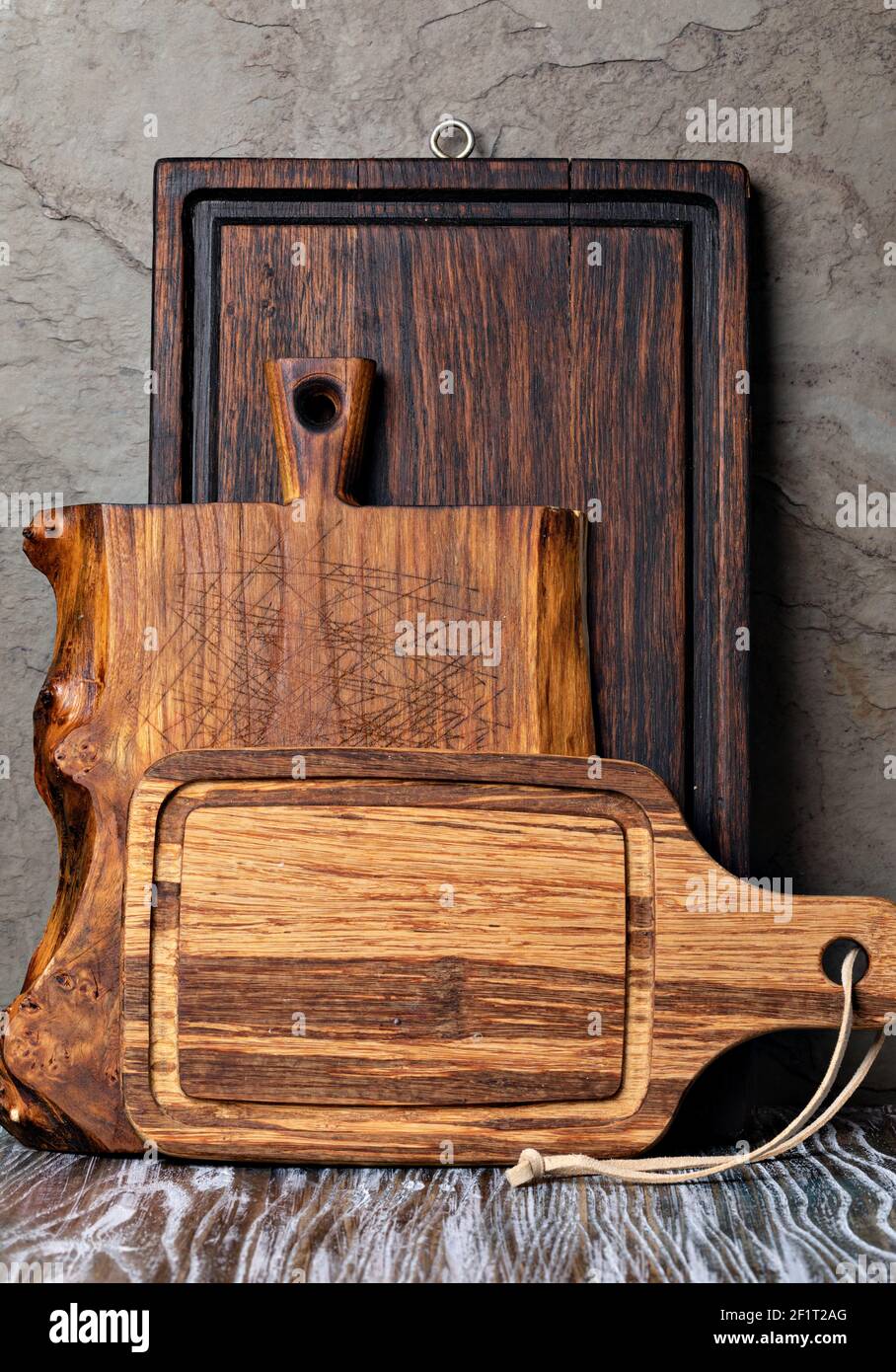 Cutting board on wooden kitchen table Stock Photo