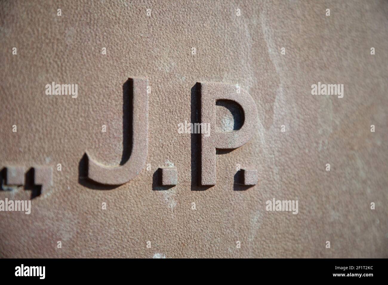 J.P. letters on a metal commemoration plaque. Stock Photo