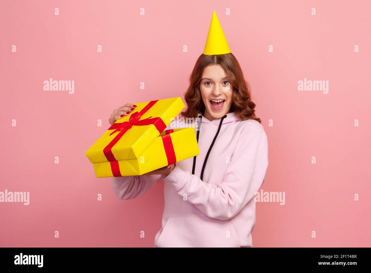 Teenage girl opening christmas gift hi-res stock photography and images -  Alamy