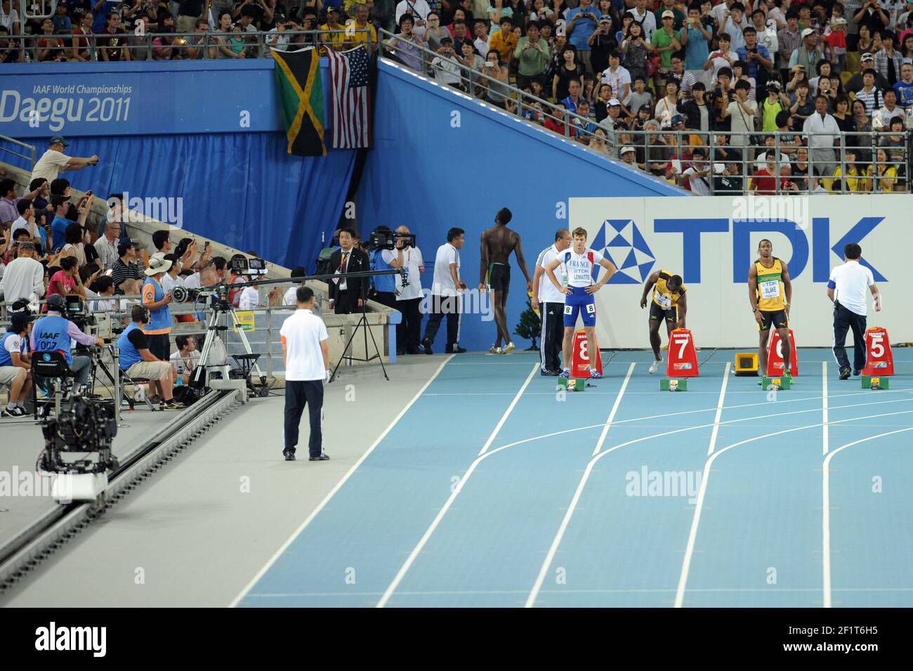 ATHLETICS - IAAF WORLD CHAMPIONSHIPS 2011 - DAEGU (KOR) - DAY 2 - 28/08/2011 - PHOTO : STEPHANE KEMPINAIRE / KMSP / DPPI - 100 M - FINALE - MEN - USAIN BOLT (JAM)DISQUALIFED FOR FALSE START - YOHAN BLAKE (JAM) - WINNER - SECOND PLACE WALTER DIX (USA) Stock Photo