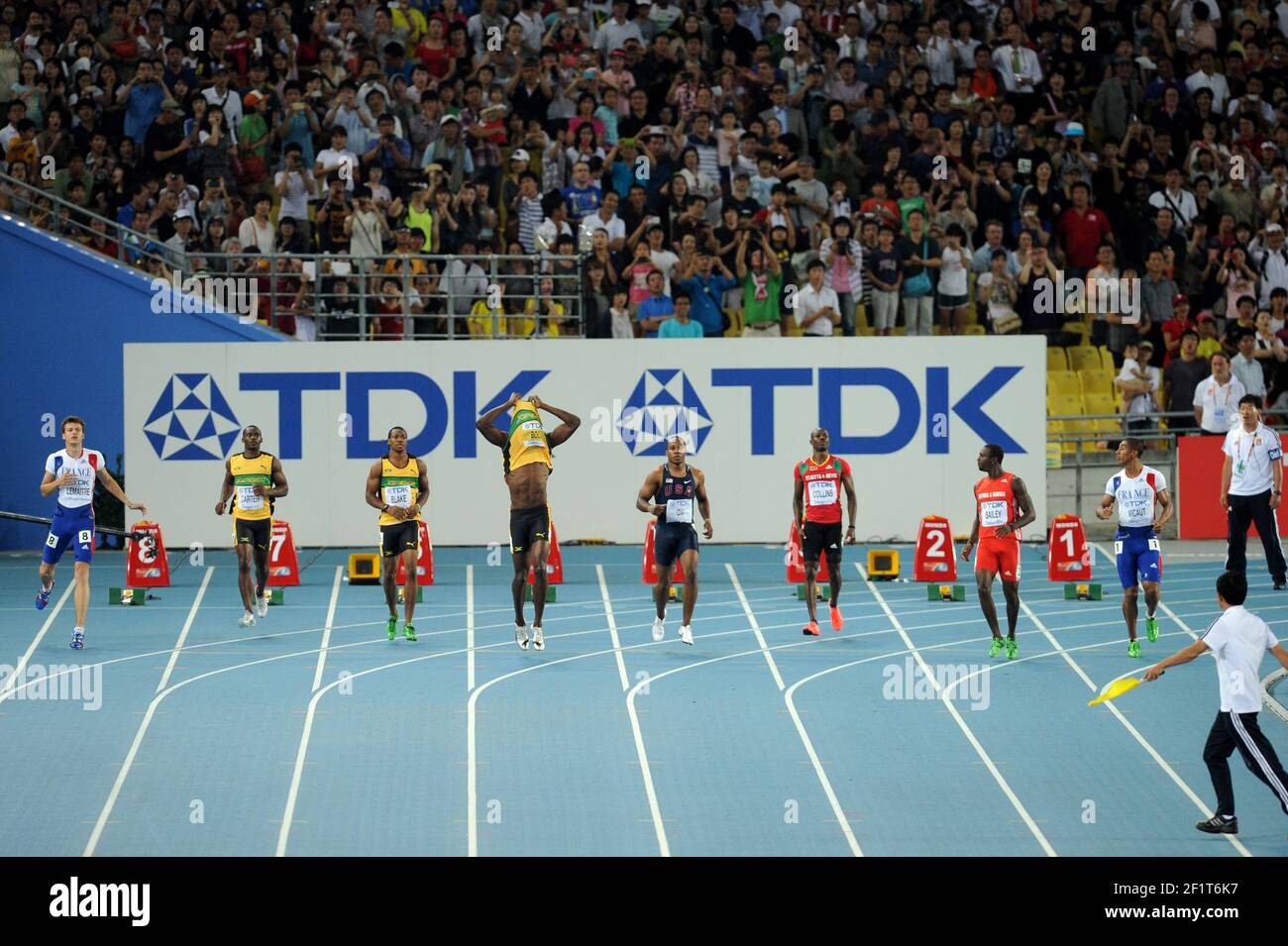 ATHLETICS - IAAF WORLD CHAMPIONSHIPS 2011 - DAEGU (KOR) - DAY 2 - 28/08/2011 - PHOTO : STEPHANE KEMPINAIRE / KMSP / DPPI - 100 M - FINALE - MEN - USAIN BOLT (JAM)DISQUALIFED FOR FALSE START - YOHAN BLAKE (JAM) - WINNER - SECOND PLACE WALTER DIX (USA) Stock Photo