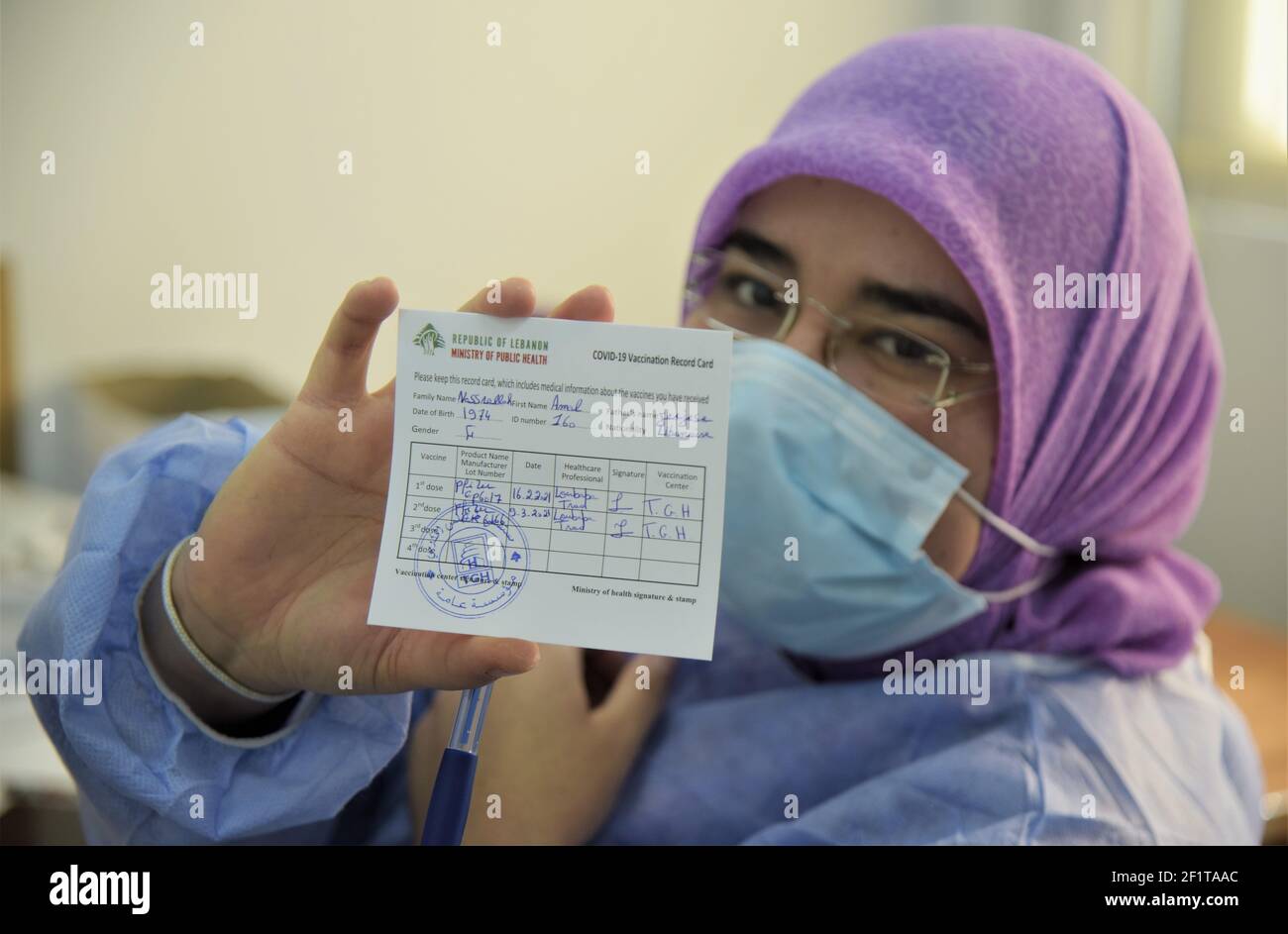 Tripoli, Lebanon. 9th Mar, 2021. A nurse shows her COVID-19 vaccination record card at a hospital in Tripoli, northern Lebanon, on March 9, 2021. Lebanon registered on Tuesday 3,939 new COVID-19 cases, raising the total number of infections to 401,810, the Health Ministry reported. Credit: Khaled/Xinhua/Alamy Live News Stock Photo