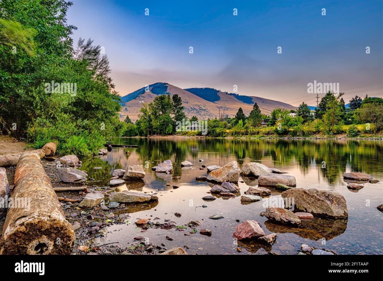 Clark Fork River in Missoula Montana, with Mount Sentinel in the background Stock Photo