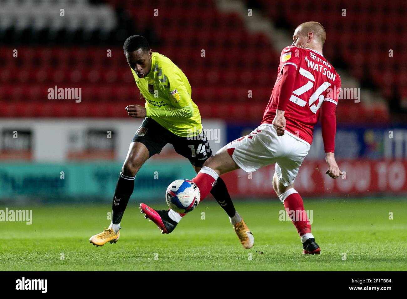 LONDON. UK. MARCH 9TH: Mickel Miller of Northampton Town and Ben Watson of Charlton compete for the ball during the Sky Bet League 1 match between Charlton Athletic and Northampton Town at The Valley, London on Tuesday 9th March 2021. (Credit: Juan Gasparini | MI News) Credit: MI News & Sport /Alamy Live News Stock Photo