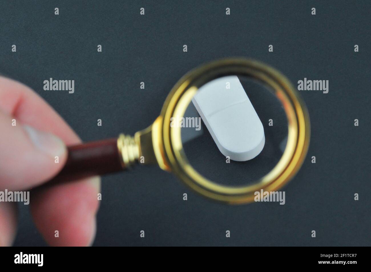 Testing, verification pharmaceutical counterfeiting or fakes of medicines and medicinal substance quality concept. Stock Photo