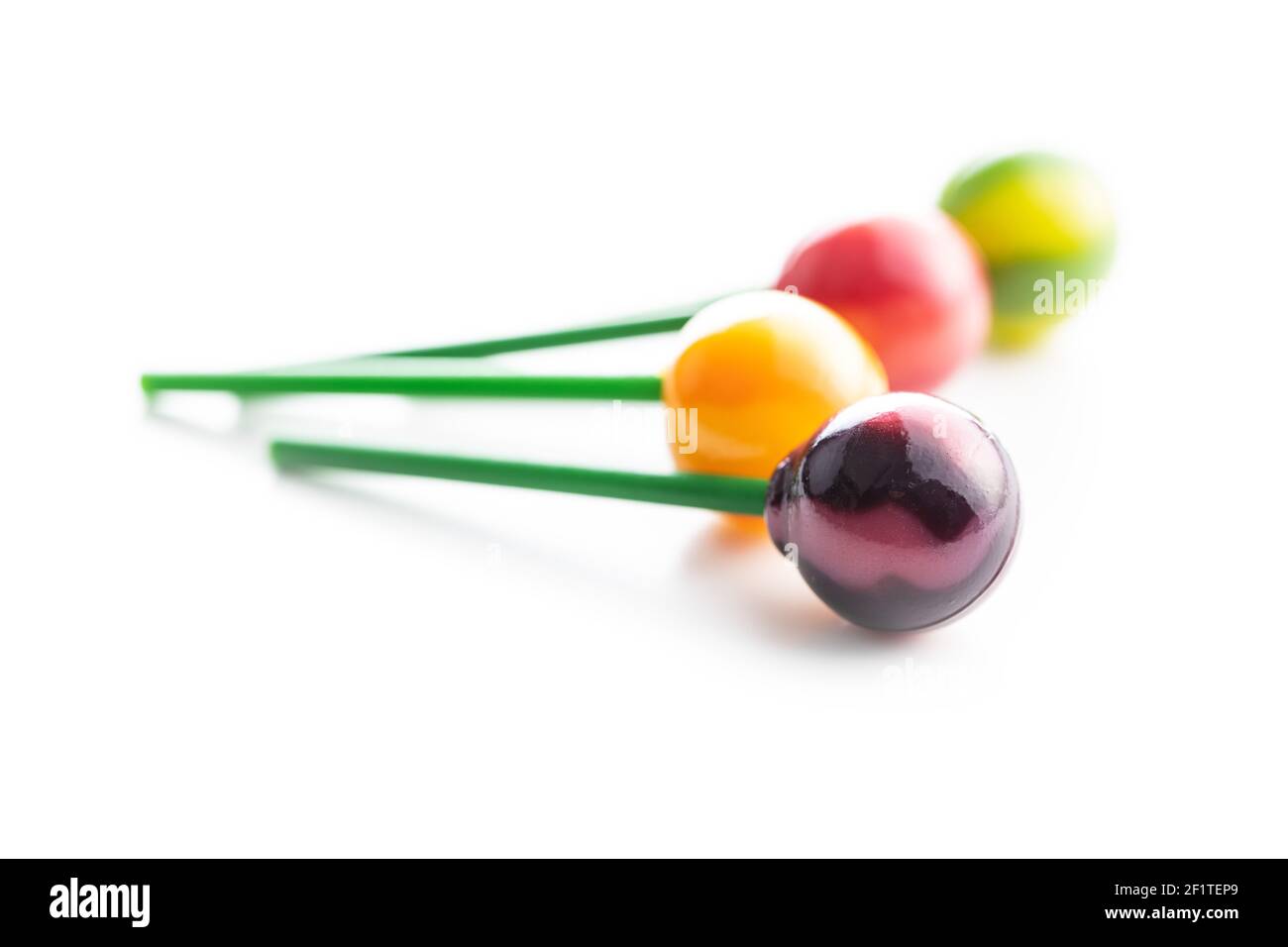 Sweet fruity lollipops isolated on white background. Stock Photo