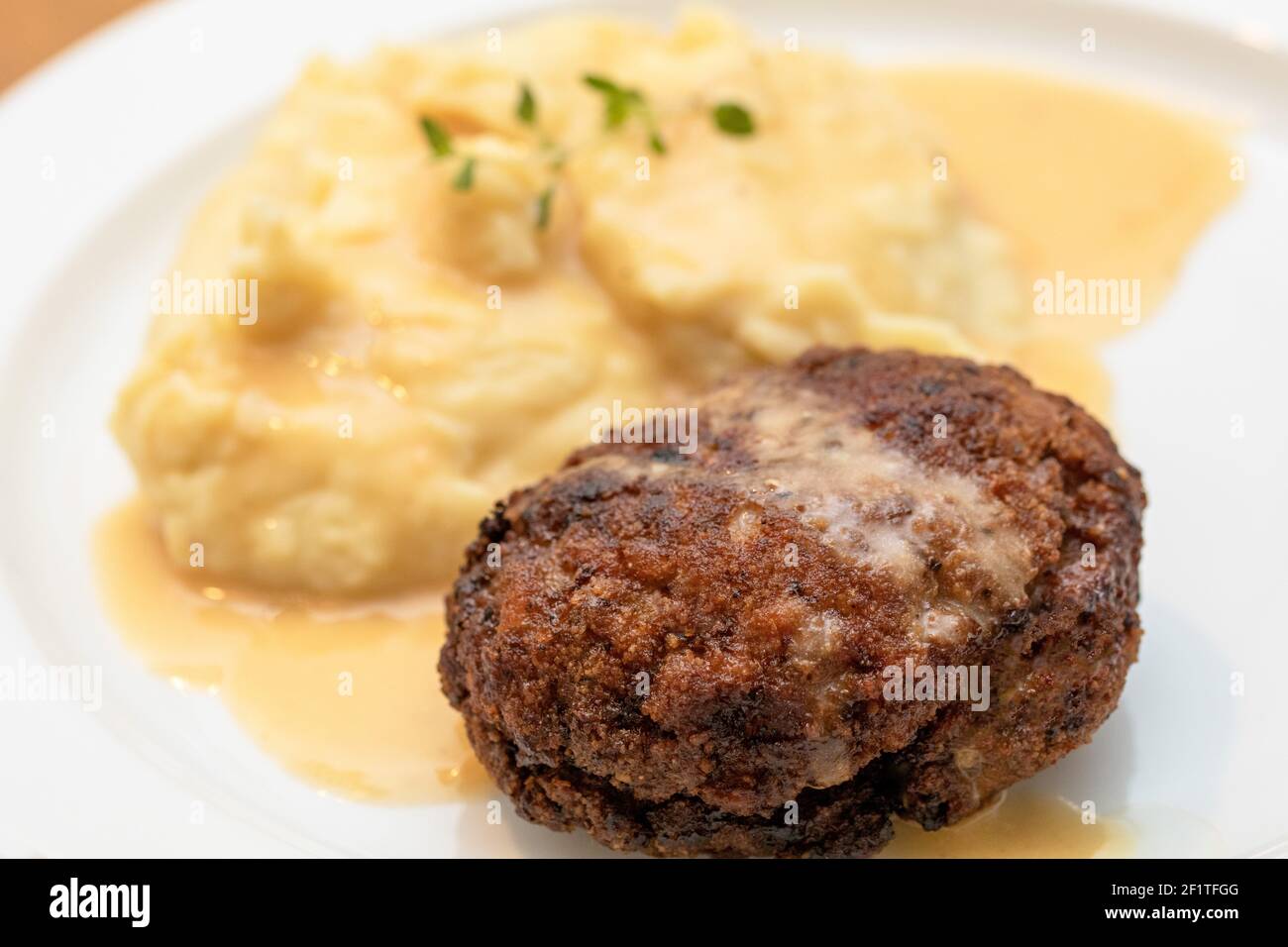 meatball with mashed potatoes and sauce Stock Photo