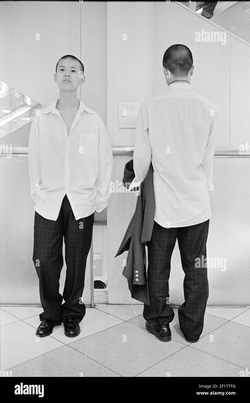 twin brothers in Tokyo, Japan Stock Photo