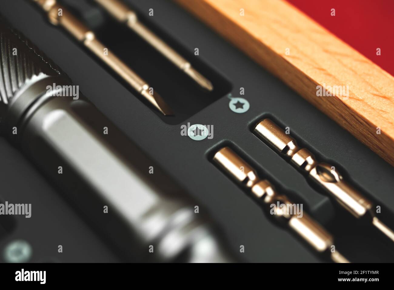 Screwdriver set tool kit close up on macro in wooden box, concept of repair Stock Photo