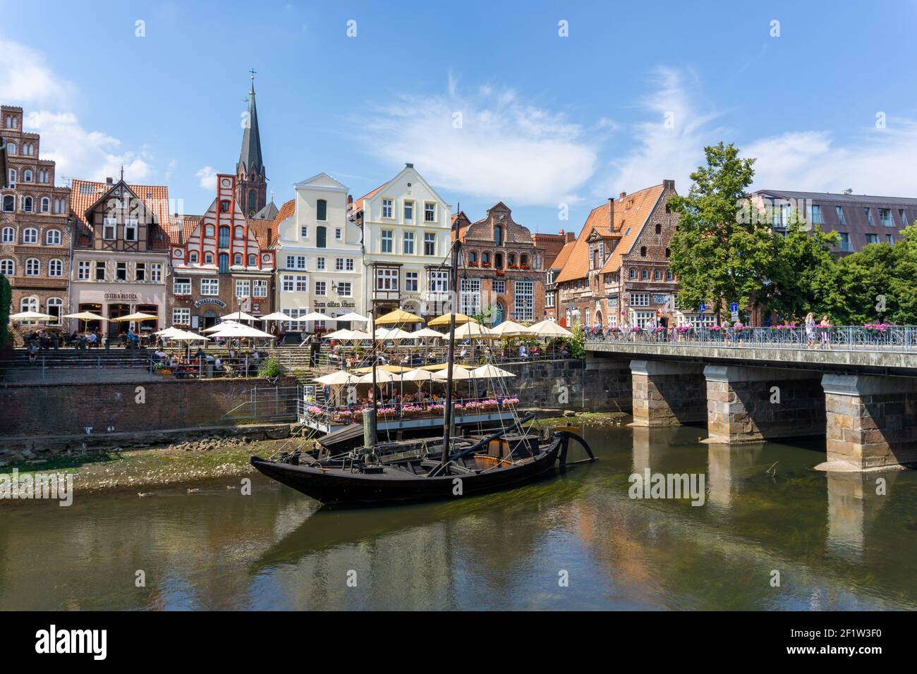 View of the river and the historic old city center of Luneburg in northern Germany Stock Photo