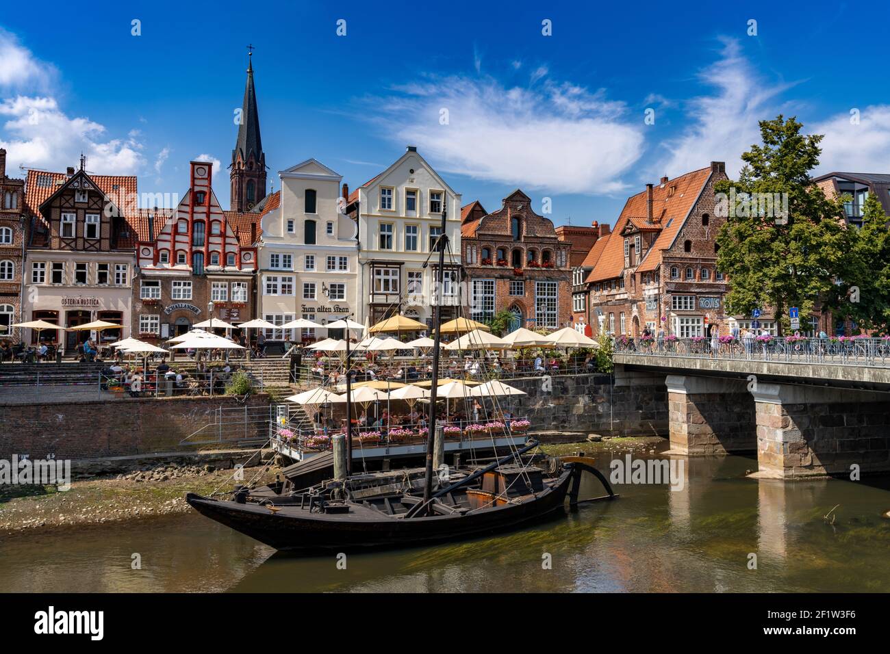 View of the river and the historic old city center of Luneburg in northern Germany Stock Photo