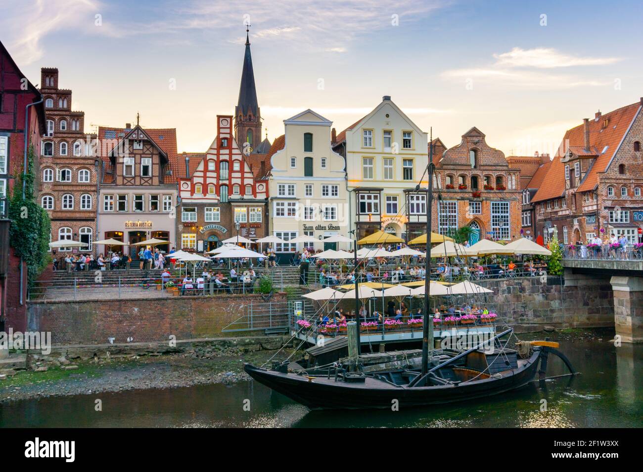 View of the river and the historic old city center of Luneburg in northern Germany Stock Photo