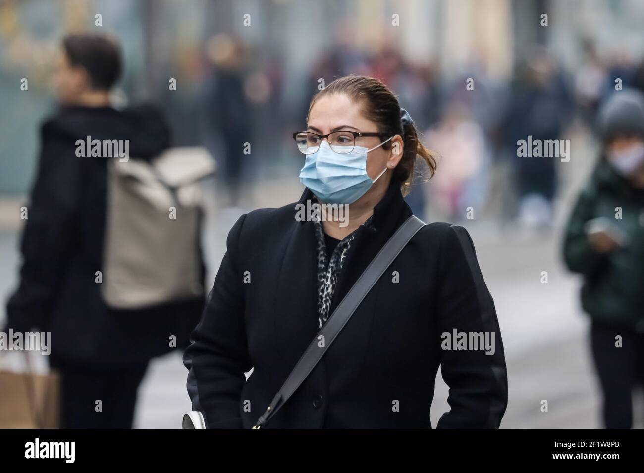 People on the Ilica streets in Zagreb are wearing medical masks because of the Coron Virus pandemic. Stock Photo