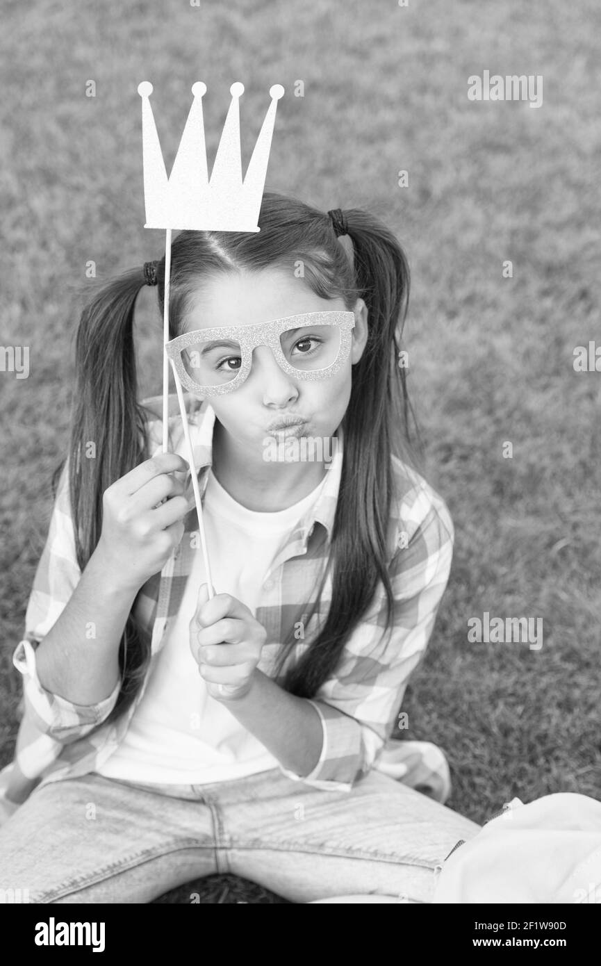 Playful Princess Girl Party Booth Props Posing For Photo Concept Stock playful-princess-girl-party-booth-props-posing-for-photo-concept-stock