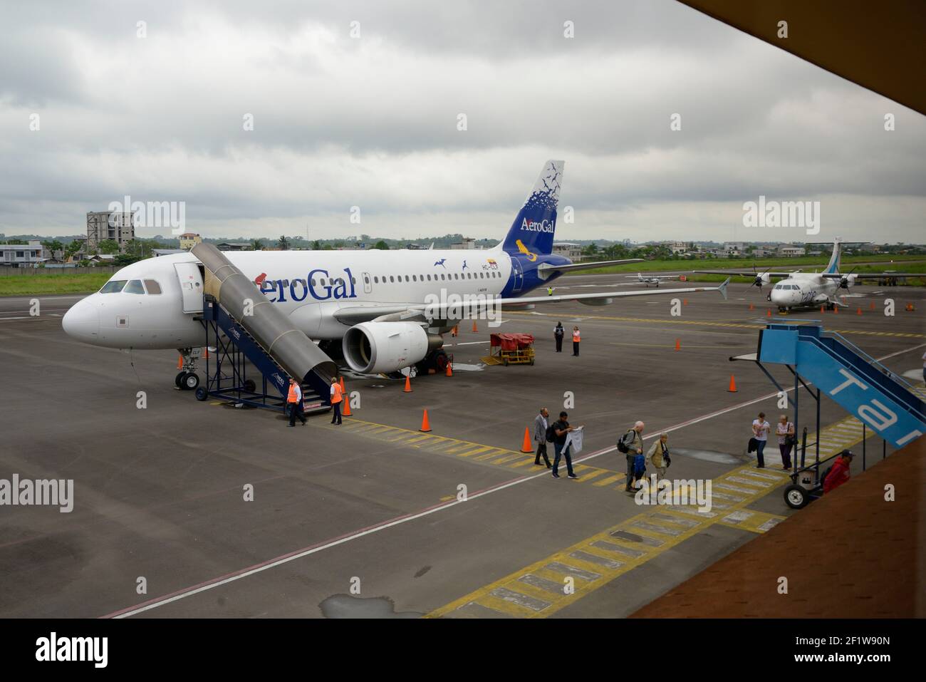 AeroGal Airbus A319 passengers disembarking at Coca Airport, Orellana, Ecuador Stock Photo