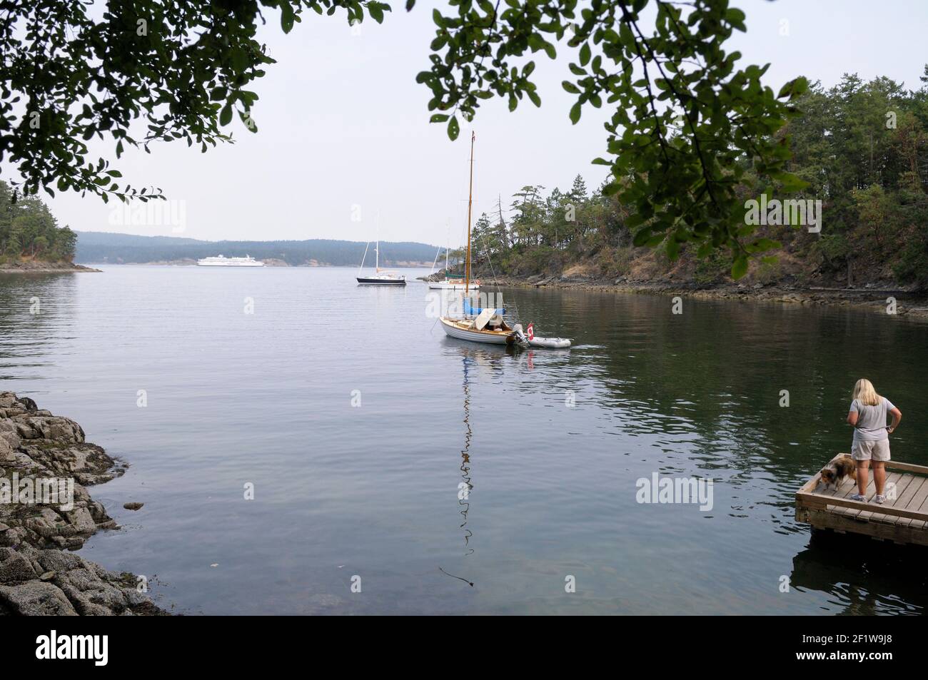 Boats at anchor in Royal Cove, Portland Island, British Columbia ...