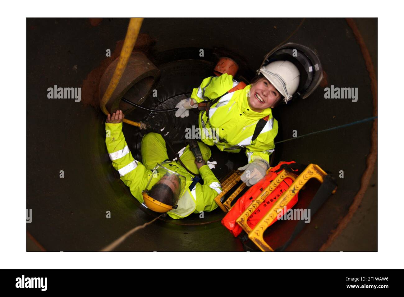 Rebecca Armstrong investigates H2O networks installing of Fibre optic cables useing the sewer network, with field engeneer H2O's Lee Roberts.photograph by David Sandison The Independent Stock Photo