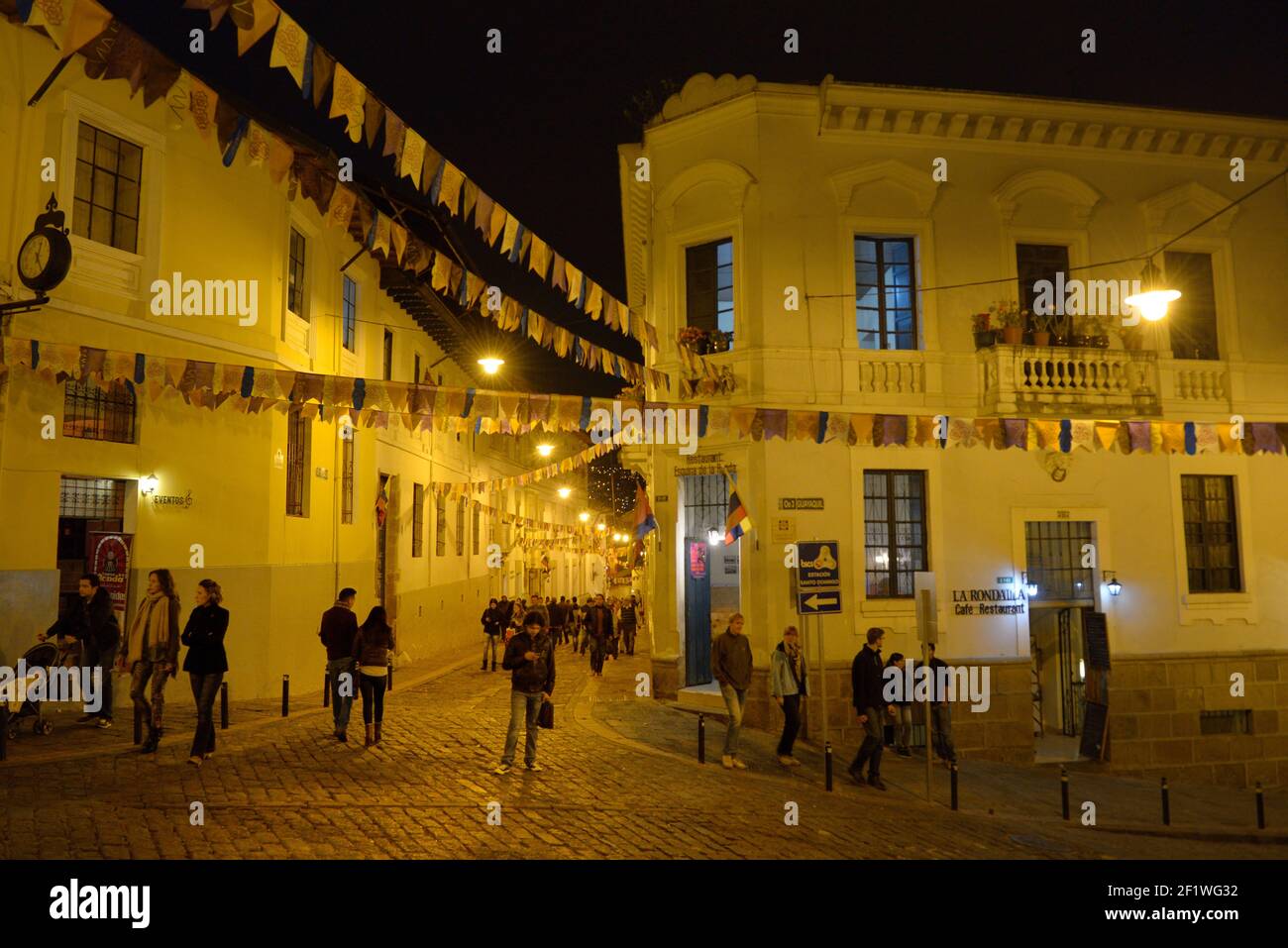 People walking on Calle Morales at night, La Ronda, Quito, Ecuador Stock Photo