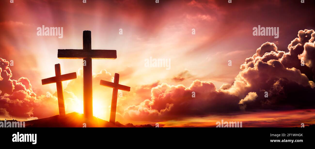 Crucifixion Of Jesus Christ- Three Crosses As Sunset Stock Photo