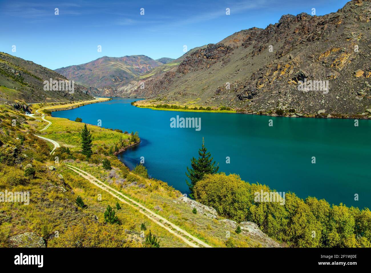 Emerald-colored quiet deep water Stock Photo