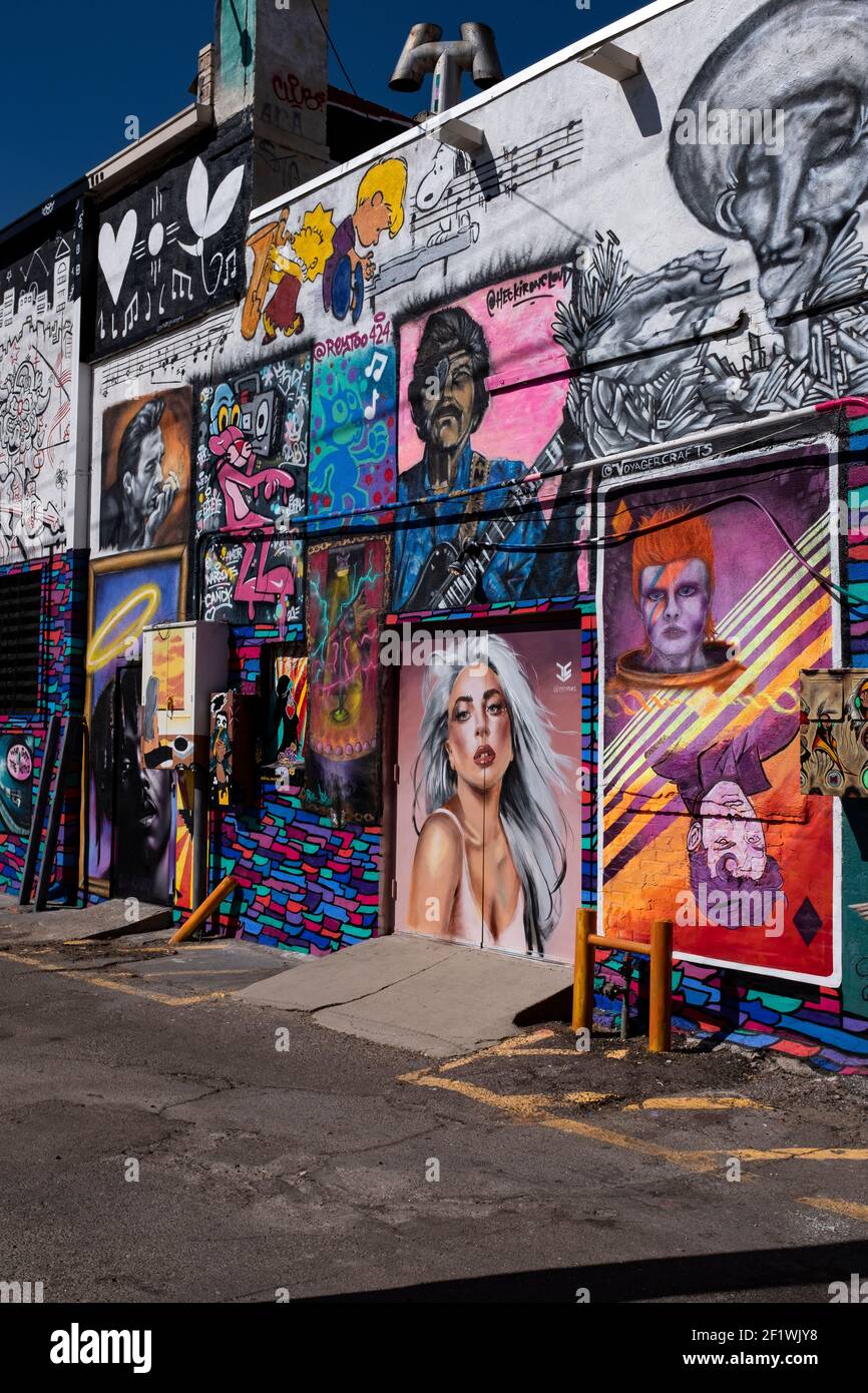 public art by various artists on the back wall of 