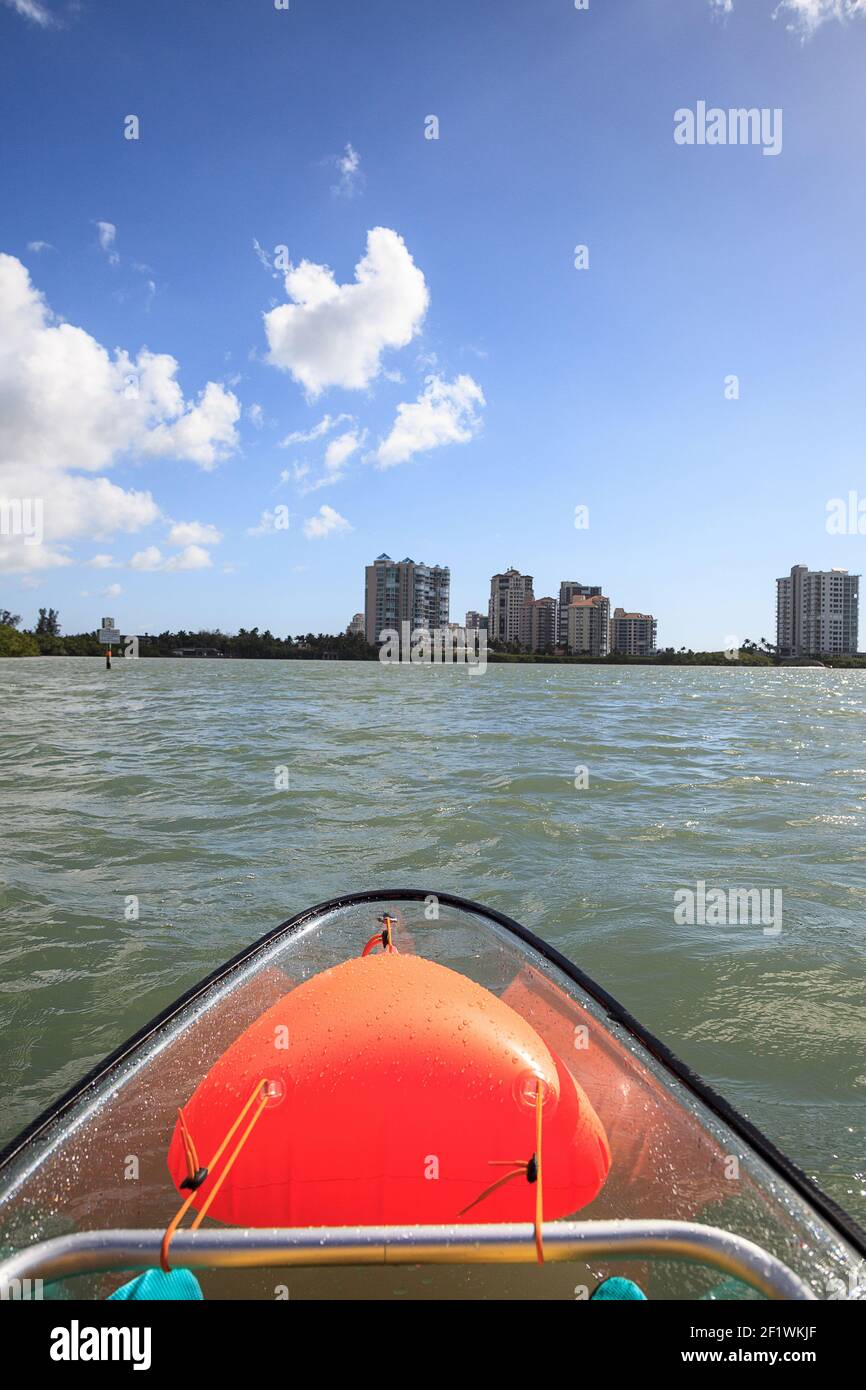 Blue skyline of buildings across from Clam Pass from the view of a
